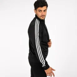 ADIDAS - GIACCA DA ALLENAMENTO PRIMEGREEN ESSENTIALS WARM-UP 3-STRIPES - H46099