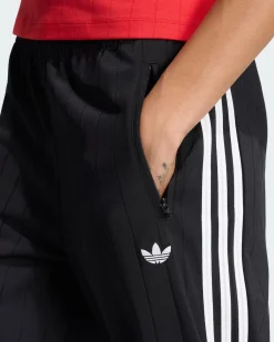 ADIDAS -PANTALONE DA ALLENAMENTO GESSATI FIREBIRD NERO CON 3 BANDE BIANCHE DA DONNA, KS6787
