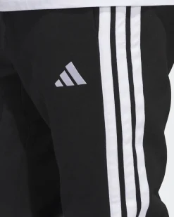 ADIDAS - PANTALONI TUTA DA UOMO NERI  ESSENTIALS 3 - STRIPES FELPATI  -JD1861