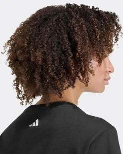 ADIDAS -  T-SHIRT MEZZA FARM FLOWERS NERA CON DETTAGLI FLOREALI DA DONNA, KR0281