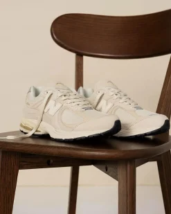 NEW BALANCE 2002R – SNEAKERS JUNIOR  LIFESTYLE SABBIA / ARGENTO – M2002RCC