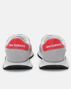 NEW BALANCE - Sneakers da uomo grigia e rossa con dettagli scamosciati - 237