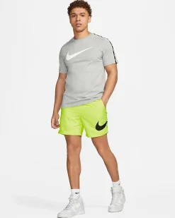 NIKE - Costume da bagno uomo giallo fluo con logo nero e tasche laterali