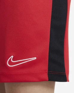 NIKE - Pantaloncini corti da bambino rossi in tessuto traspirante con logo bianco e bande laterali nere